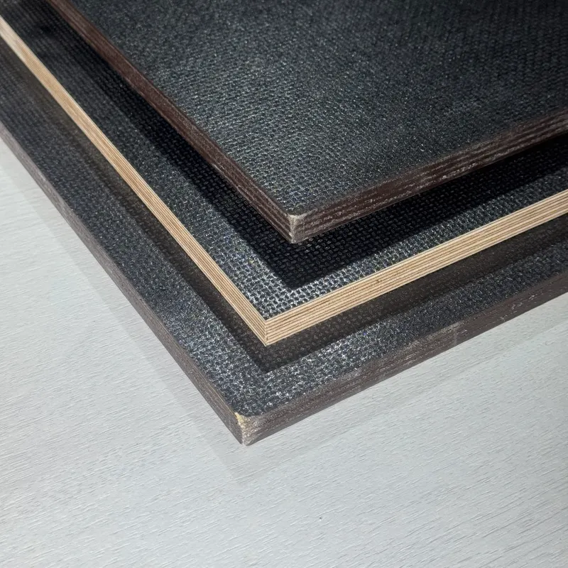 Black textured film-faced plywood panels with birch layered edges